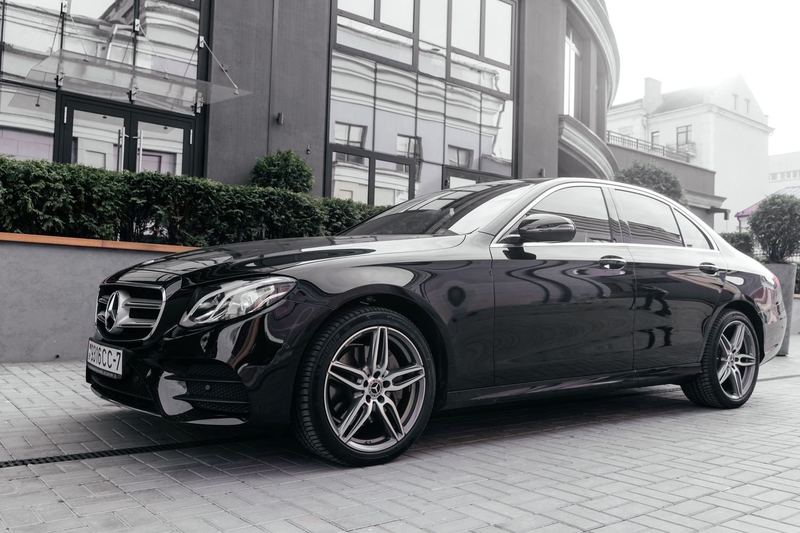 Executive Sedan — Mercedes-Benz E-Class, BMW 5 Series, Cadillac XTS or similar